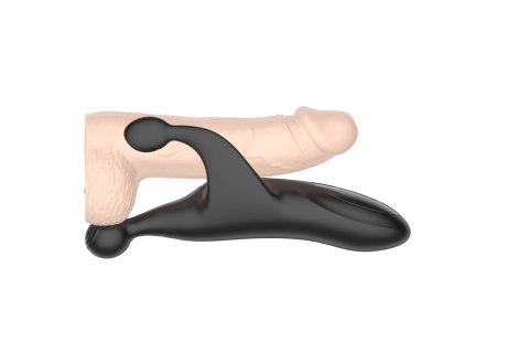 Tapping and vibrating penis stimulator